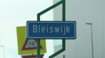 Blue and white sign to mark the start of the urban area in Bleiswijk in the Netherlands