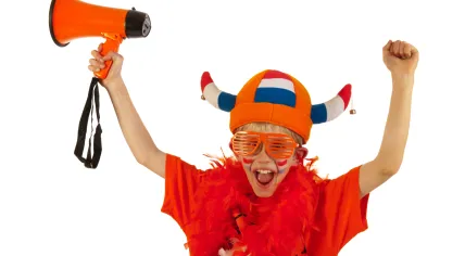 Football loving boy dressed to support Oranje, the Dutch national team
