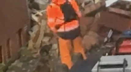 A USAR search team member working with a dog at the scene of an explosion on Osdorper Ban in Amsterdam. 12 June 2026