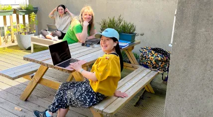 Students working on their Dutch coursework on the roof terrace at NedLes. June 2026