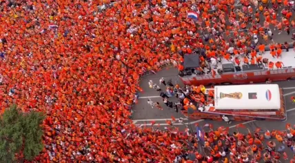 Dutch football fans swarmed around the vintage and modern double-decker Oranjebuses ahead of the Netherlands - Tunisia group stage World Cup match in Kansas City. 25 June 2026