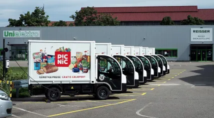 Row of Picnic delivery trucks in Karlsruhe, Germany, July 2024.