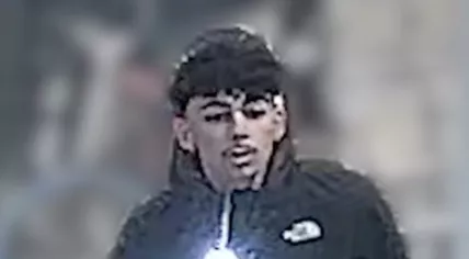 One of the suspects wanted for the group assault in a Groningen supermarket. 