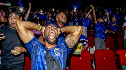 Cape Verde fans react emotionally after their team scores in a 3-2 loss to Argentina, ending its World Cup run. July 3, 2026.
