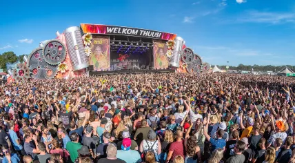 Large crowd of people around a stage at the Zwarte Cross festival in 2022