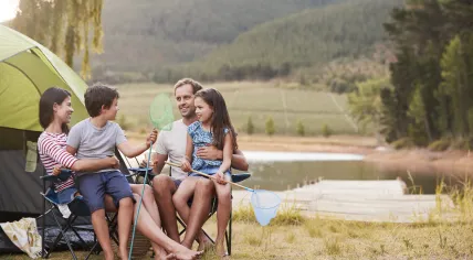 A family at a campsite.