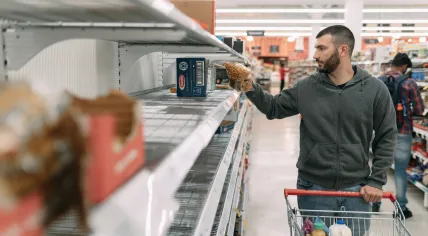 Empty grocery stores shelf. Undated.