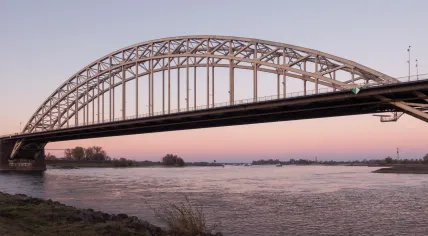 The Waalbrug seen from the Nijmegen Bloxx on Waalkade. 19 Nov. 2022