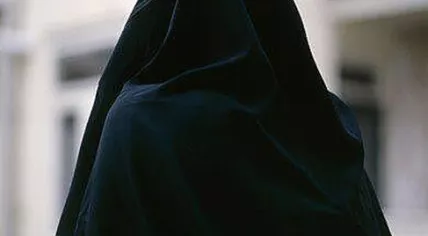 487px-Muslim_Woman_in_black