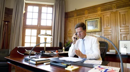 Mark Rutte in his office (Source: Wikimedia/ATX-NL)