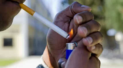 Lighting_a_cigarette