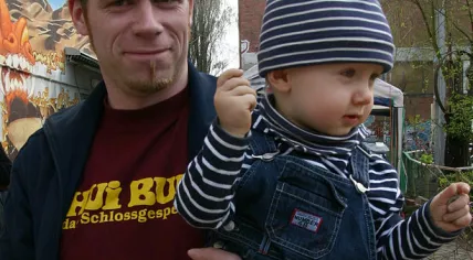 613px-Father_with_child