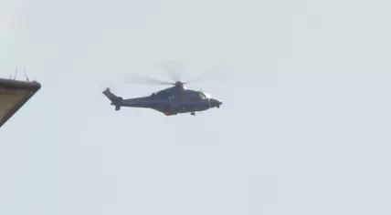 Armored car stunt helicopter