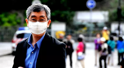 1280px-Travelling_with_Swine_Flu