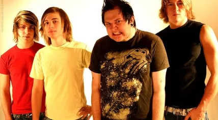 Four_teenage_boys_wearing_t-shirts