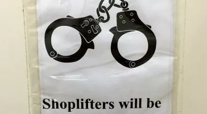 Shoplifting_sign_cuffs1