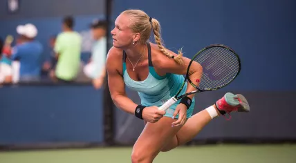 2015_US_Open_Tennis_-_Qualies_-_Kiki_Bertens_(NED)_(8)_def._Xinyun_Han_(CHN)_(21019308589)