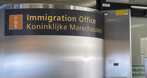 An immigration checkpoint operated by the Marechaussee at Schiphol Airport. 13 December 2022