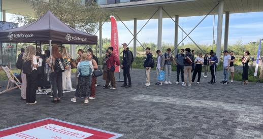 Students line up for coffee at the Koffiebrigade stand set up on the first day of the academic year at the University of Amsterdam’s Science Park campus, 4 September 2023