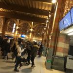 Travelers at Amsterdam Centraal check information boards for train cancellations, 11 Dec 2017