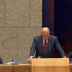 Justice Minister Ferdinand Grapperhaus speaking in parliament with Health Minister Hugo de Jonge and Prime Minister Mark Rutte sitting behind him, 2 September 2020