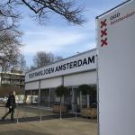 A person entering the coronavirus testing facility in Amsterdam Noord. 24 March 2021