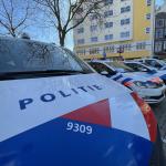 Police cars lined up across from the Nieuwmarkt in Amsterdam. 19 March 2021