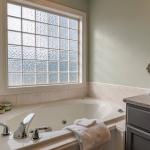 White ceramic bathtub in a bathroom