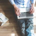 Man with laptop, tablet and smartphone