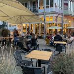 Customers outside Cafe Tisfris in Amsterdam just before closing time. Sept. 25, 2021