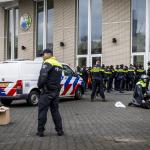 Police arrest protesters who stormed the OPCW building on Johan de Wittlaan in The Hague, 3 December 2021