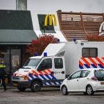 Police at the McDonald's on  on Floresstraat in Zwolle the day after two men were shot dead there, 31 March 2022