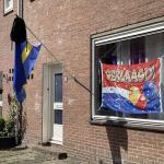 Backpack on top of flag of Curaçao in Zaandam on June 11, 2022. 