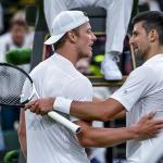 Novak Djokovic (R) of Serbia greets Tim van Rijthoven (L) of the Netherlands after Djokovic defeated van Rijthoven during their Men's fourth round match at the Wimbledon Championships, 3 July 2022