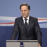 Prime Minister Mark Rutte jokes with reporters during a press conference. 15 July 2022