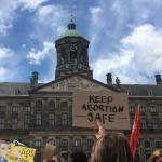 Signs at a protest for abortion rights at Dam Square in Amsterdam on July 2, 2022.