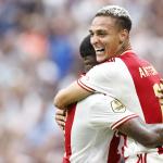 Steven Bergwijn and Antony Matheus Dos Santos celebrate an 3-1 Ajax victor over FC Croningen in the Johan Cruijff Arena, 14 August 2022