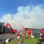 Emergency services fighting a fire at an agricultural business on Herenweg in Heemstede, 12 September 2022