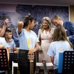 Queen Maxima and King Willem-Alexander speaking with child refugees before a music concert. Some children approached the royal couple to discuss the trauma they have experienced as refugees. 1 November 2022