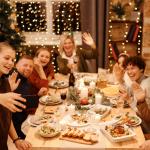 A family takes a selfie during a Christmas dinner