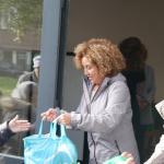 A Red Cross worker distributing food packages in Amsterdam