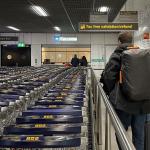 People waiting for VAT refunds at the Global Blue checkpoint from Douane, the Dutch Customs office, in Schiphol Airport. 13 December 2022