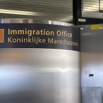 An immigration checkpoint operated by the Marechaussee at Schiphol Airport. 13 December 2022