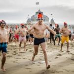 Thousands take part in the annual New Year’s Dive at Scheveningen Beach. 1 January 2023