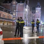 Police at the scene of a stabbing at the Ibis hotel next to Amsterdam Central Station, 9 March 2023