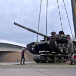 Damaged Russian tank and Ukrainian ambulance placed at the Freedom Museum in Goesbeek as a protest exhibition against the war in Ukraine, 17 March 2023