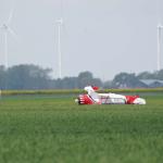 A Waco Classic YMF biplane flipped over after the pilot landed it next to the Oostwold Airport runway. 18 May 2023