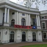 Extinction Rebellion activists hang banner and occupy the courtyard of the Noord-Holland provincial house, Paviljoen Welgelegen on Haarlemse Dreef.