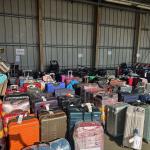 Baggage stuck since June 28 at Schiphol Airport lined up at the airport in Florence, Italy on July 9, 2023