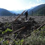 A rescuer takes part in a search and rescue operation at the site of a landslide in the Racha Region, Georgia August 4, 2023.